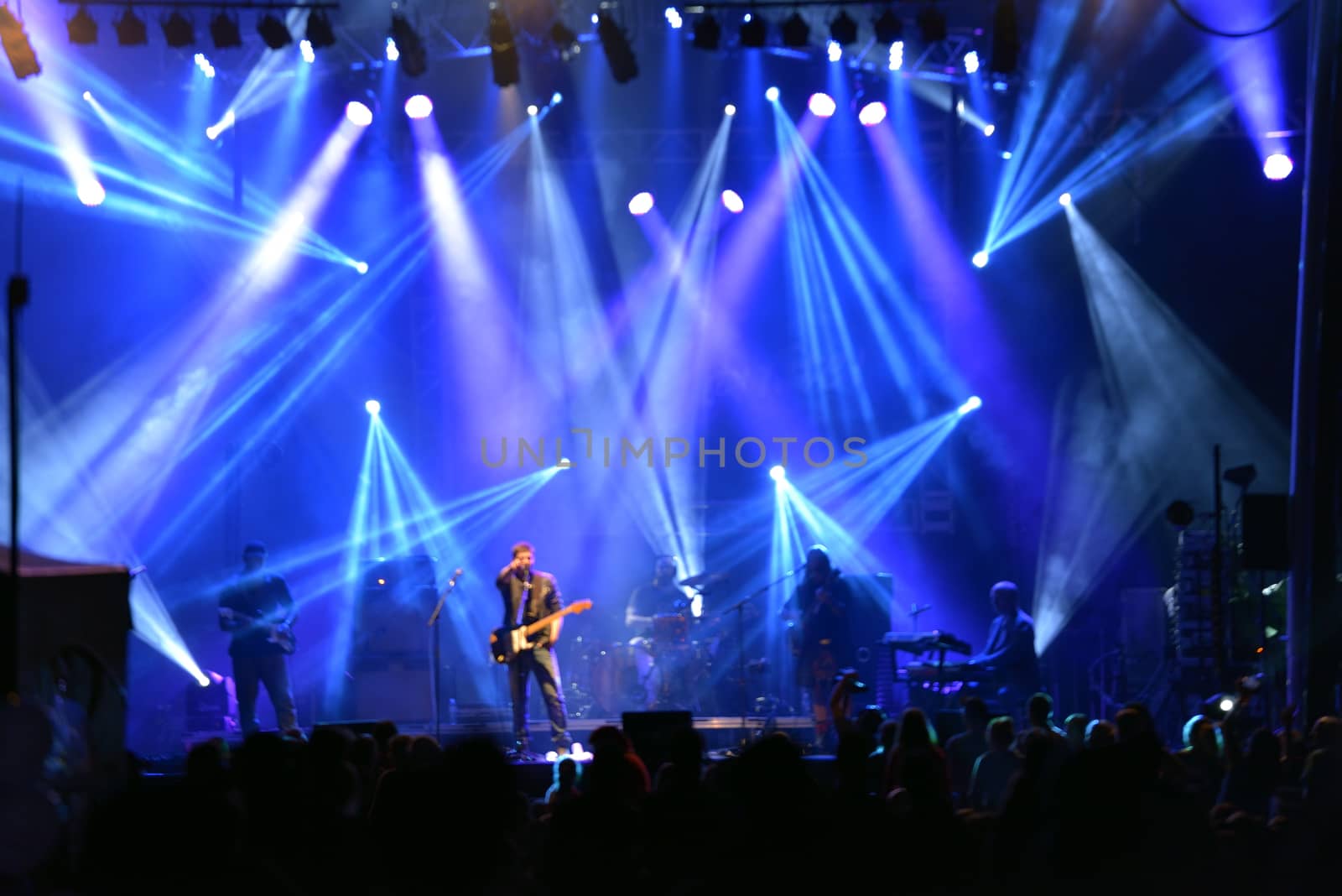 Outdoor rock concert light background illumination in summer