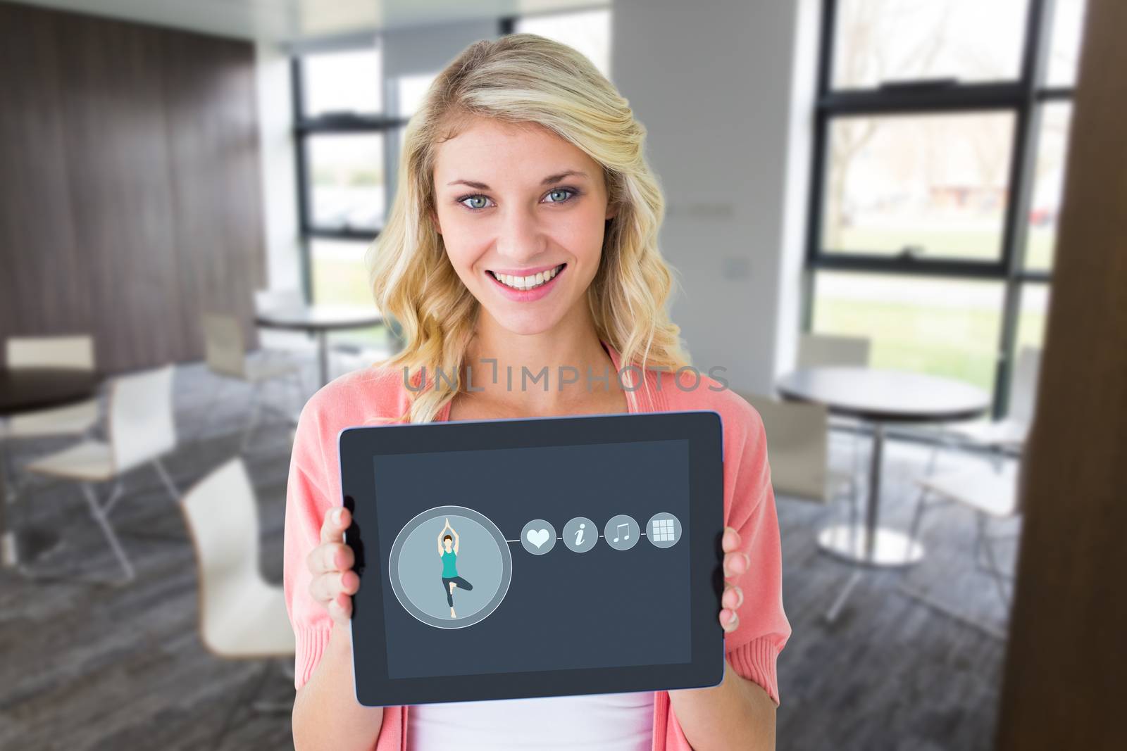 Composite image of young pretty student showing tablet pc by Wavebreakmedia