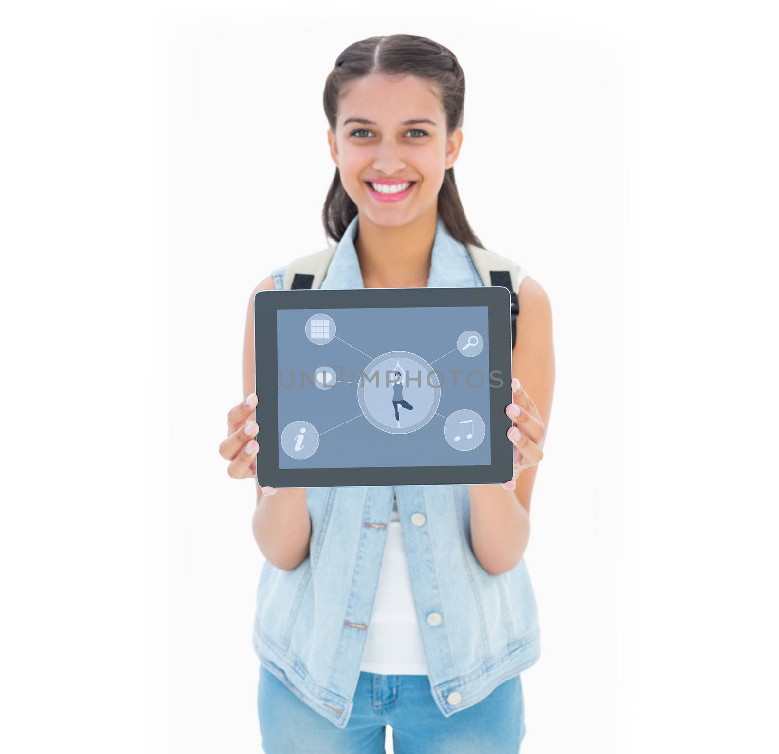 Composite image of pretty student showing her tablet pc by Wavebreakmedia