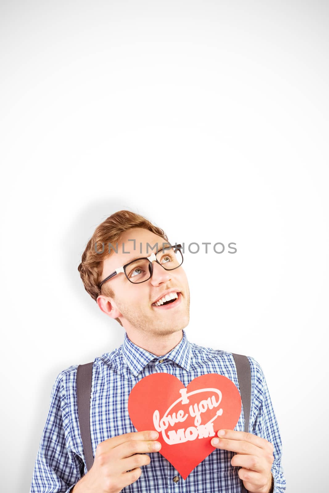 Geeky hipster holding a heart card against mothers day greeting