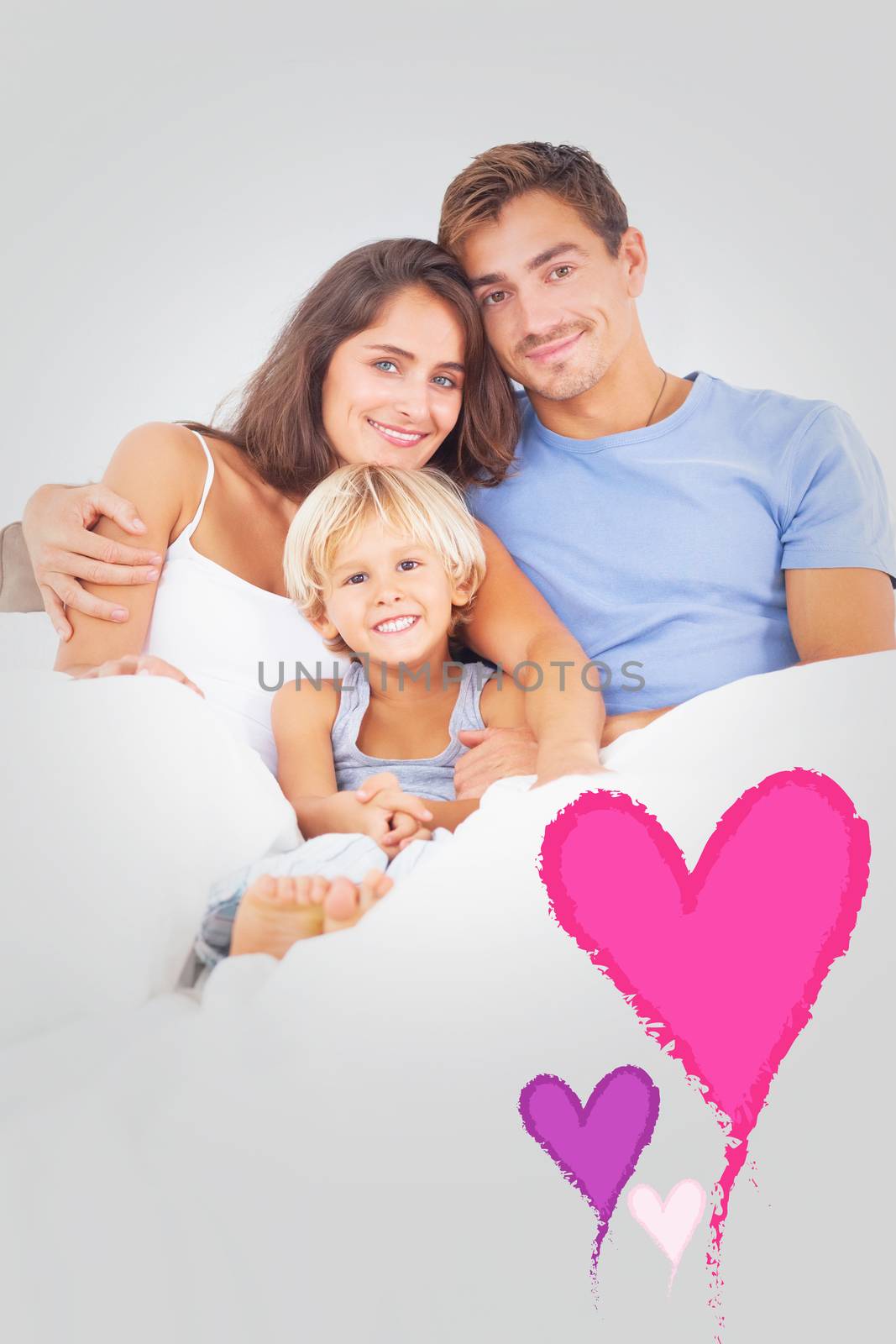 Composite image of lovely family embracing  by Wavebreakmedia