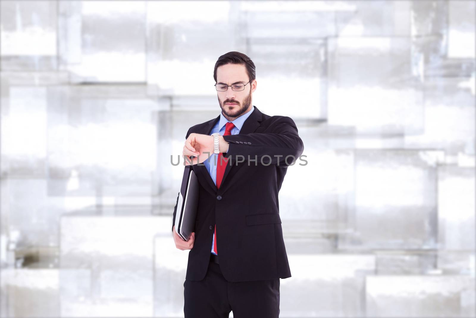 Composite image of frowning young businessman checking time by Wavebreakmedia