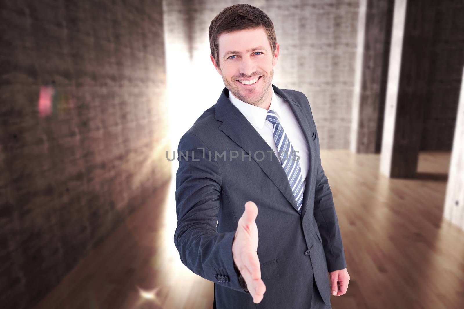 Composite image of businessman smiling and offering his hand by Wavebreakmedia