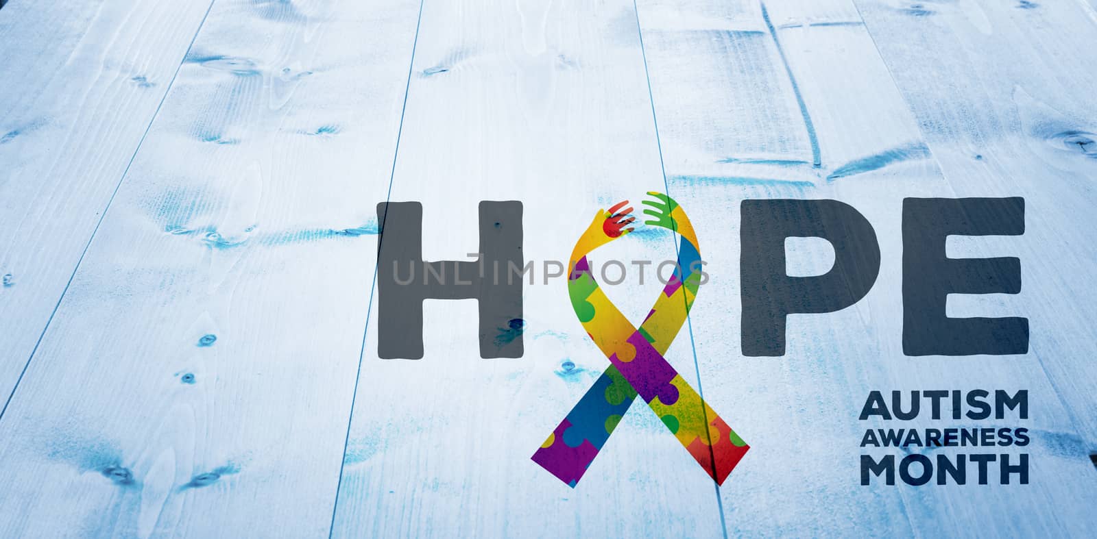 autism awareness month against bleached wooden planks background