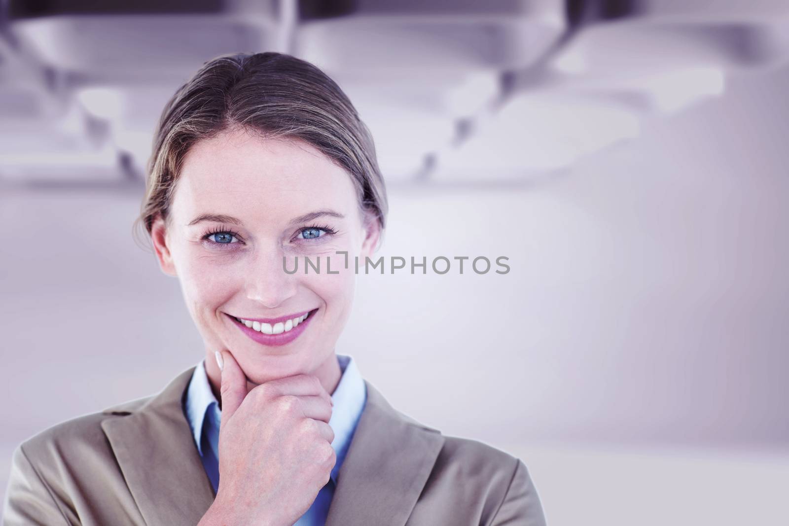 Smiling businesswoman  against white abstract room