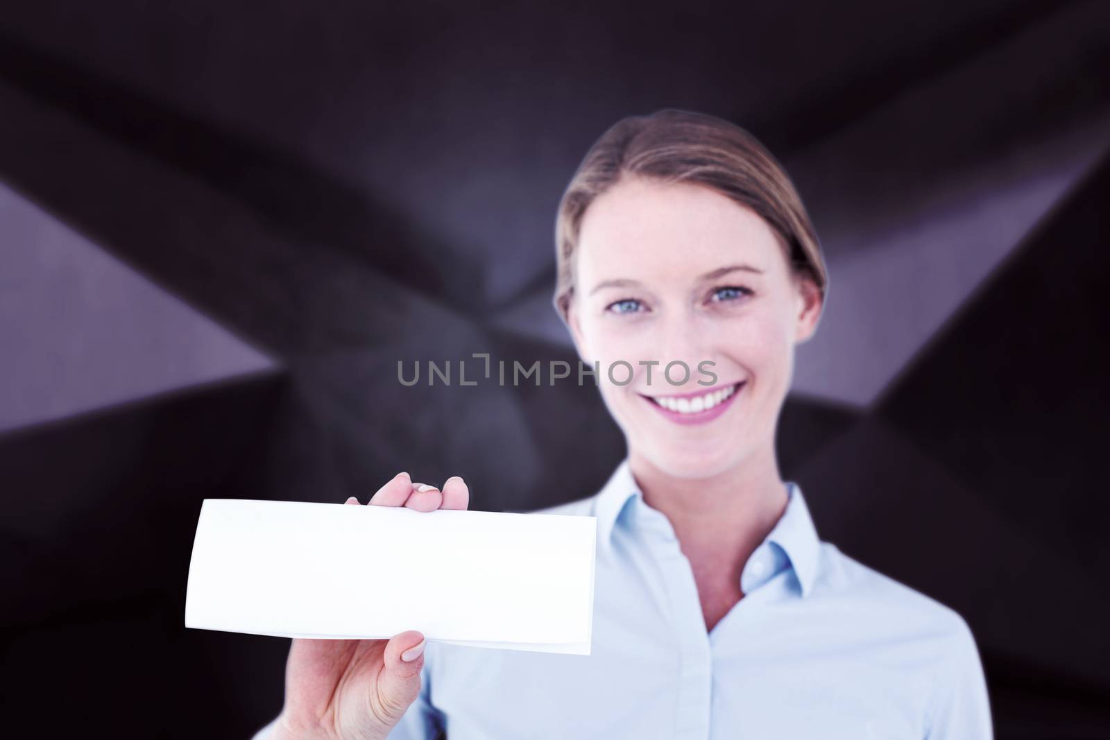 Composite image of businesswoman showing her business card  by Wavebreakmedia