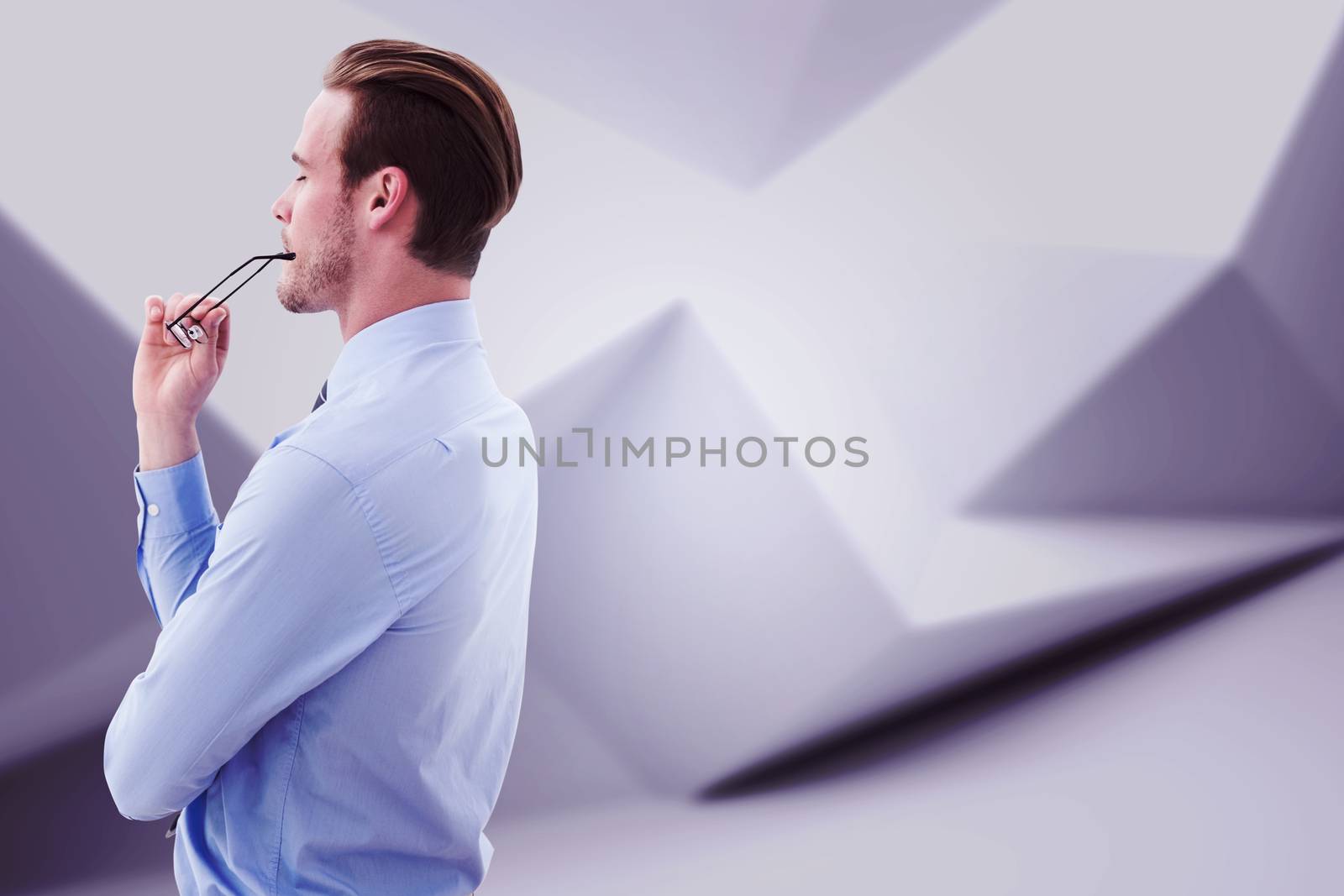 Composite image of businessman thinking by Wavebreakmedia