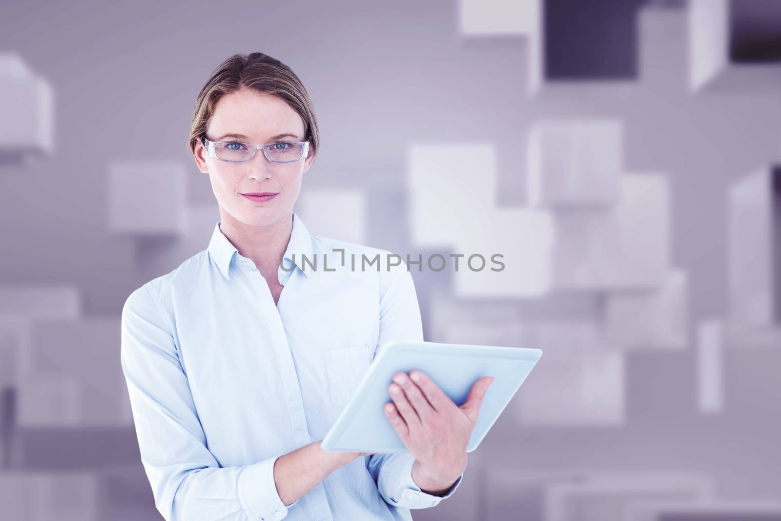 Businesswoman using tablet pc  against abstract white room