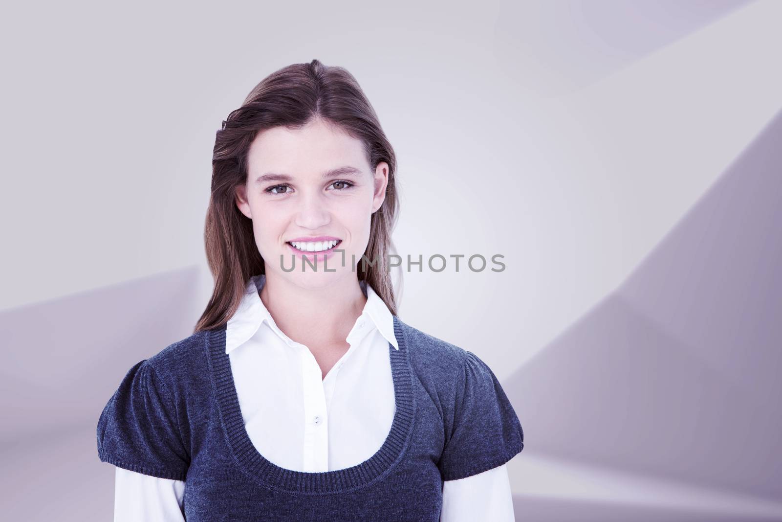 Pretty woman smiling at camera  against abstract white room