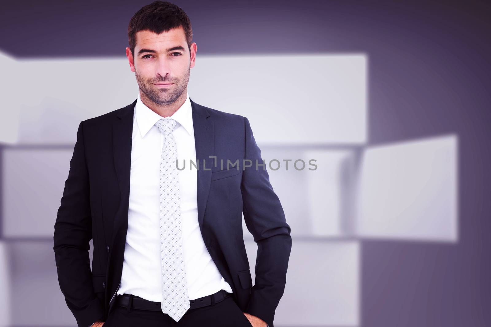 Smiling businessman looking at camera against abstract room