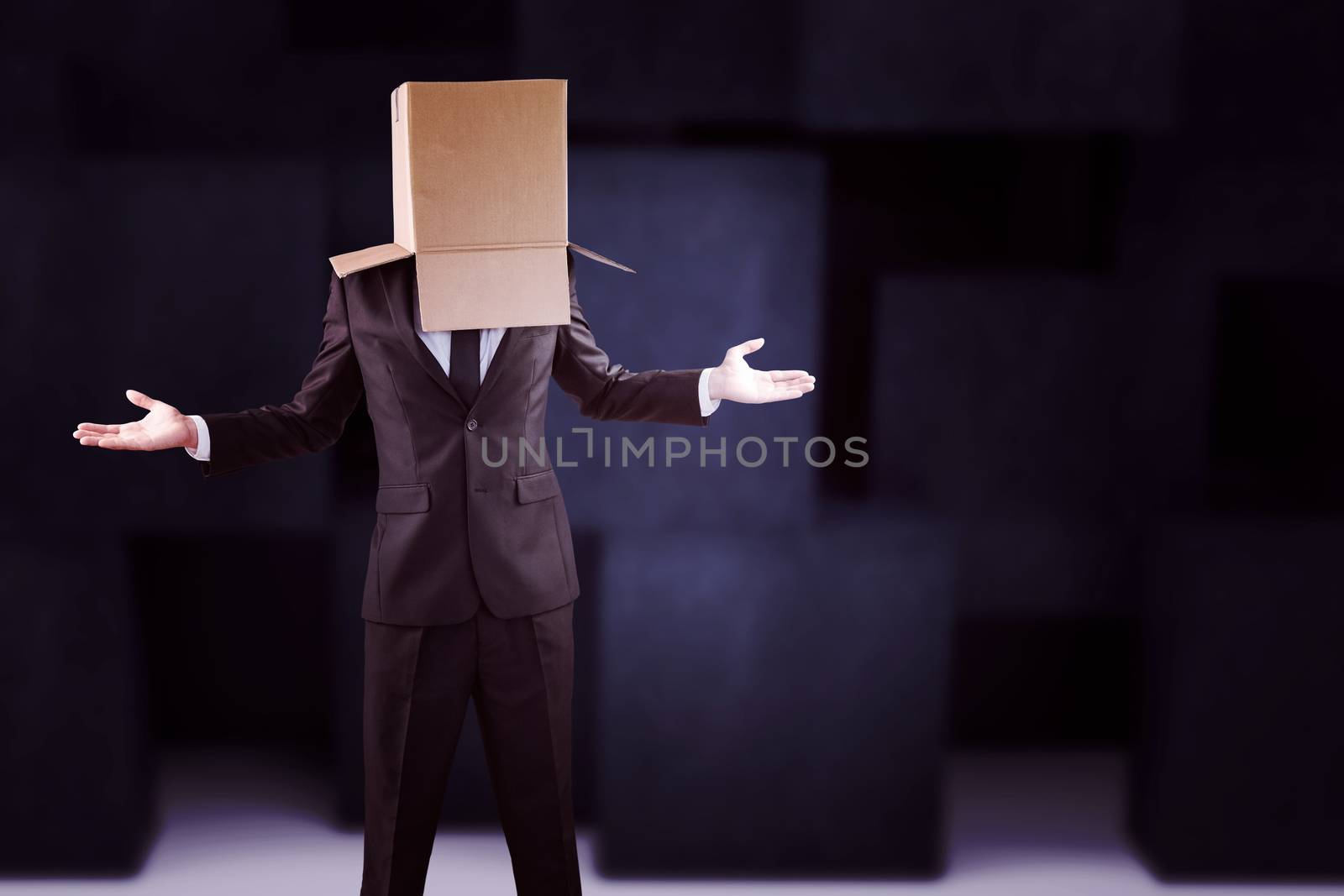 Composite image of anonymous businessman with hands out by Wavebreakmedia