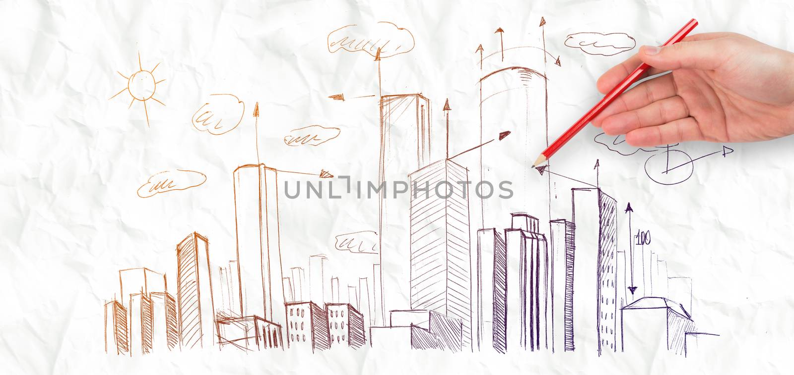 Hand writing with a pencil against crumpled white page 