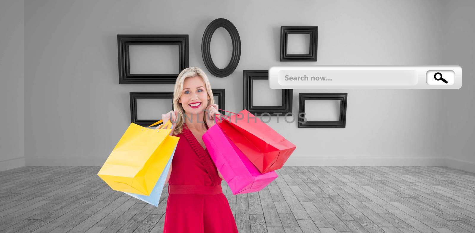 Composite image of stylish blonde in red dress holding shopping bags by Wavebreakmedia