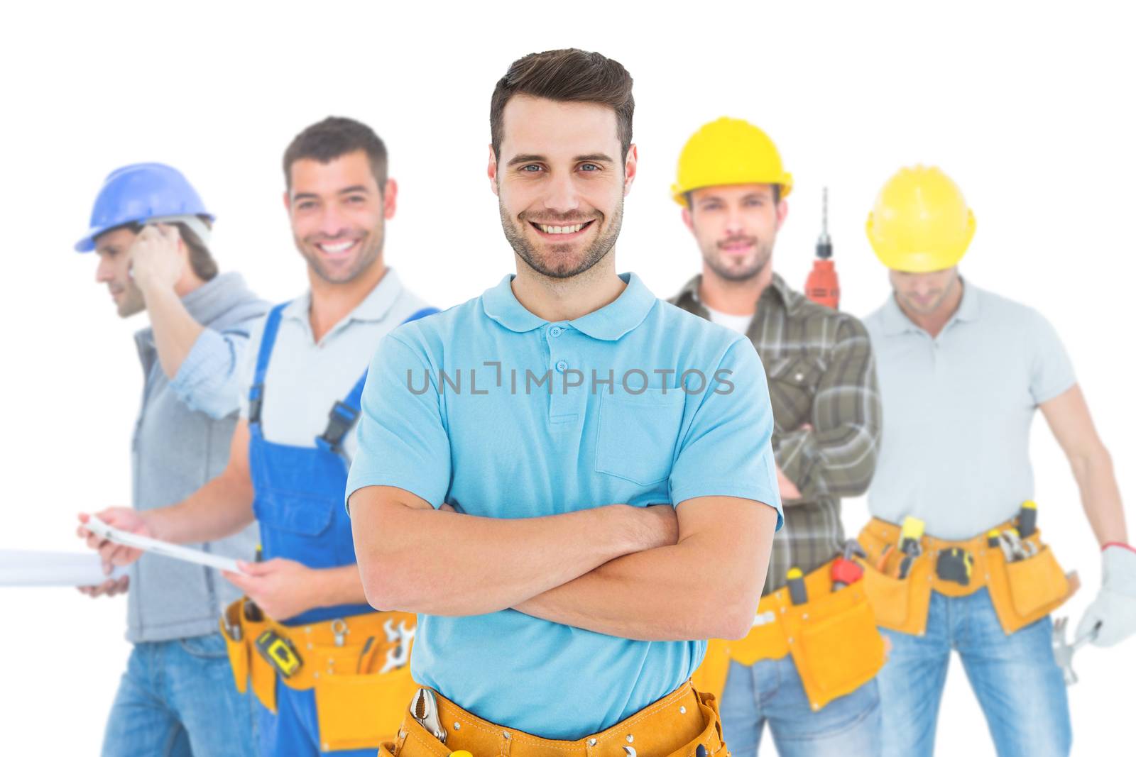 Composite image of happy carpenter standing arms crossed