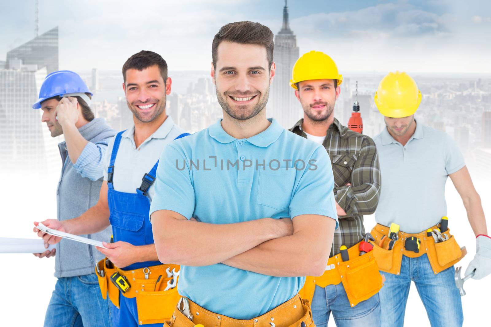 Composite image of happy carpenter standing arms crossed