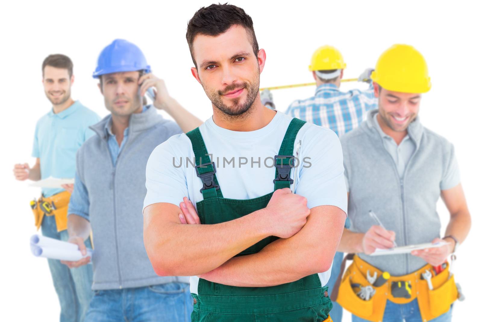 Composite image of carpenter smiling at camera 