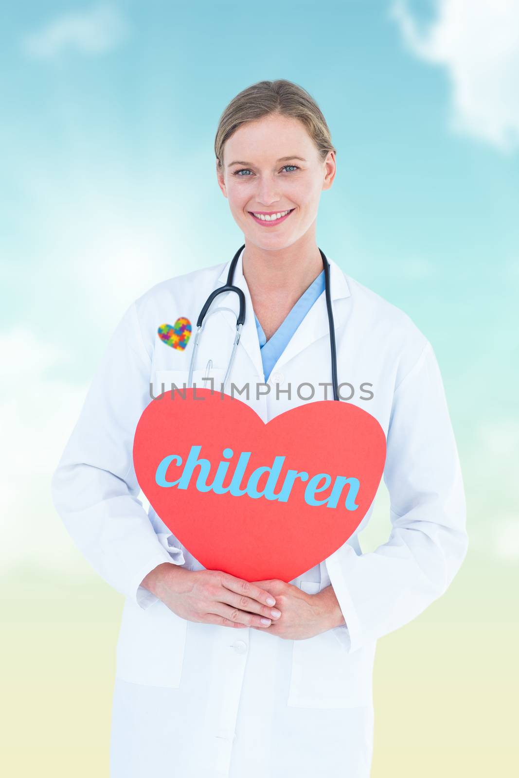 The word children and doctor holding red heart card  against blue sky