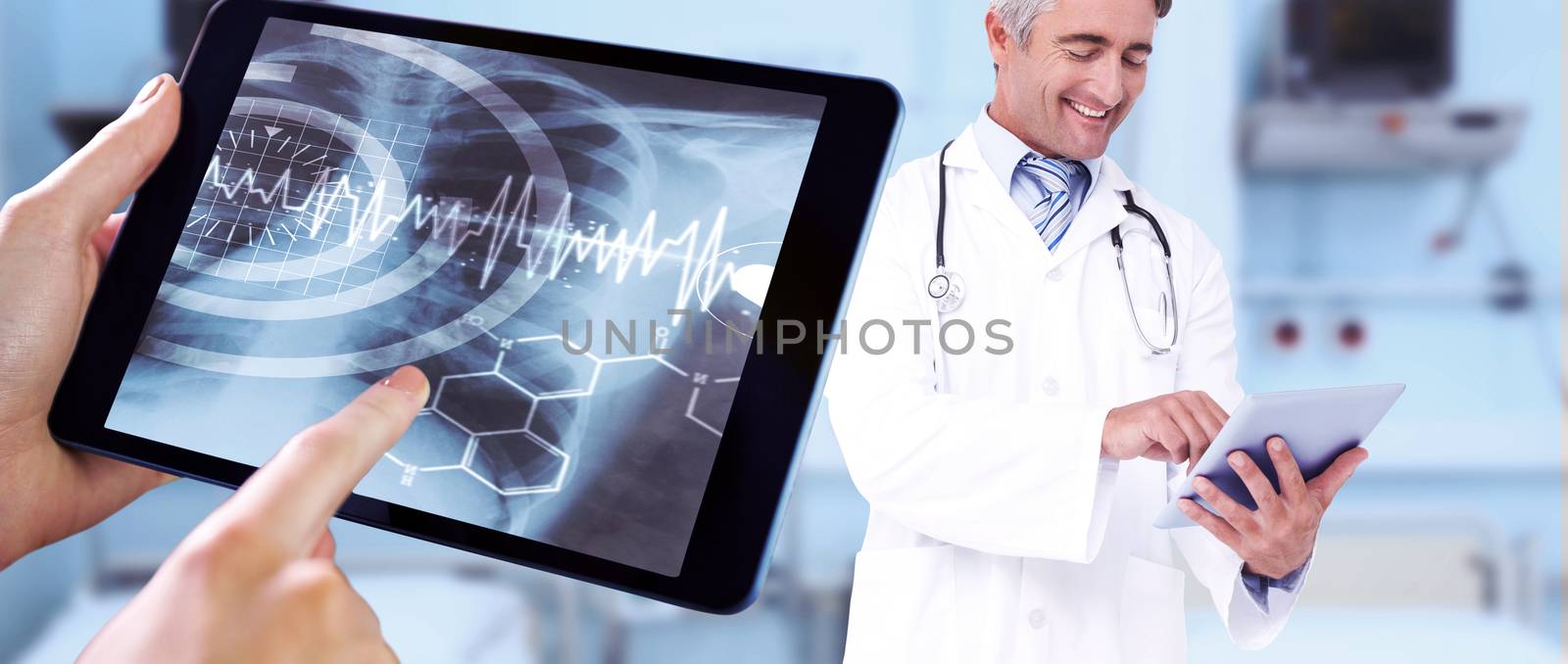 Man using tablet pc against sterile bedroom