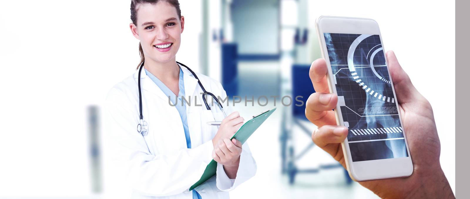 hand holding smartphone against wheelchair in the corridor