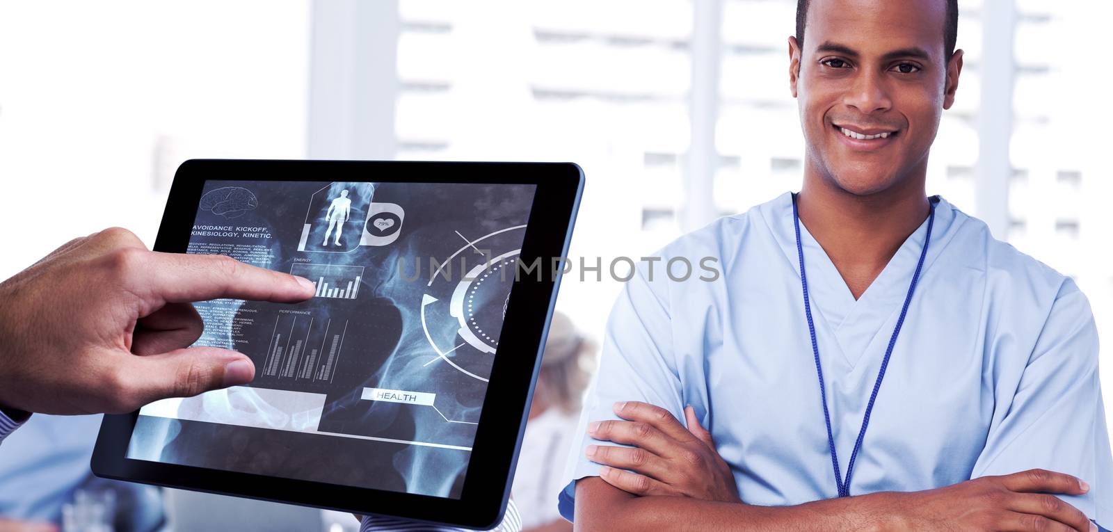 Composite image of man using tablet pc  by Wavebreakmedia