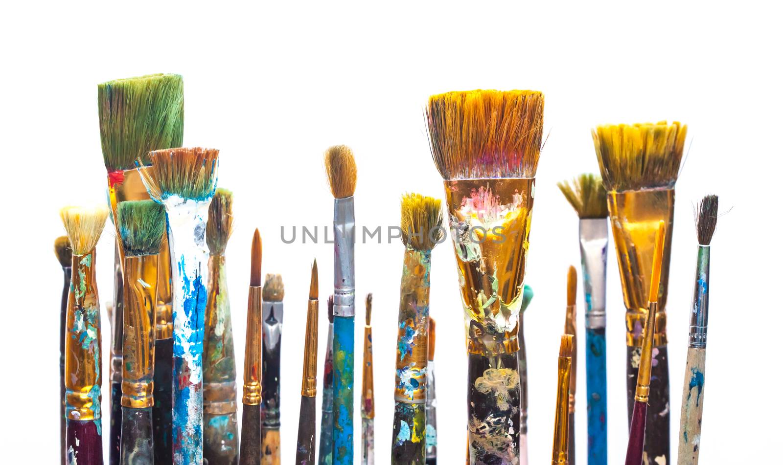 Paints and brushes on white background by Chechotkin