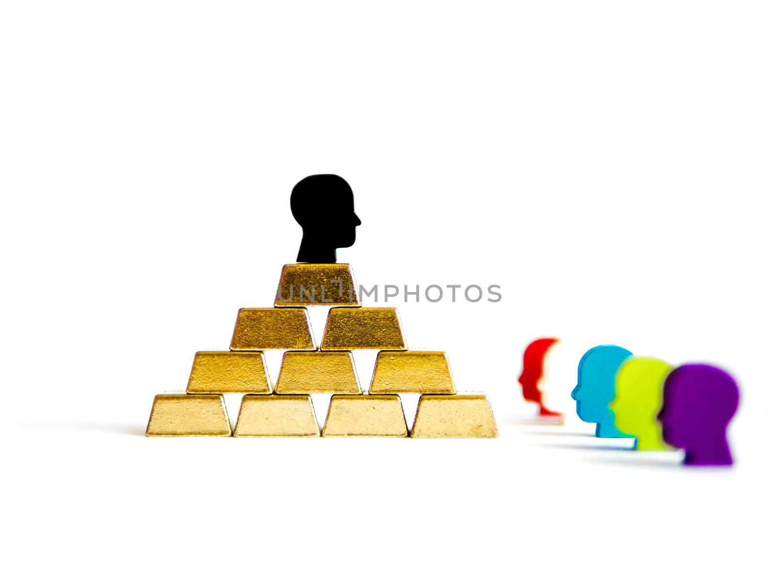 Golden bricks: wealth inequality conceptualisation isolated with tokens