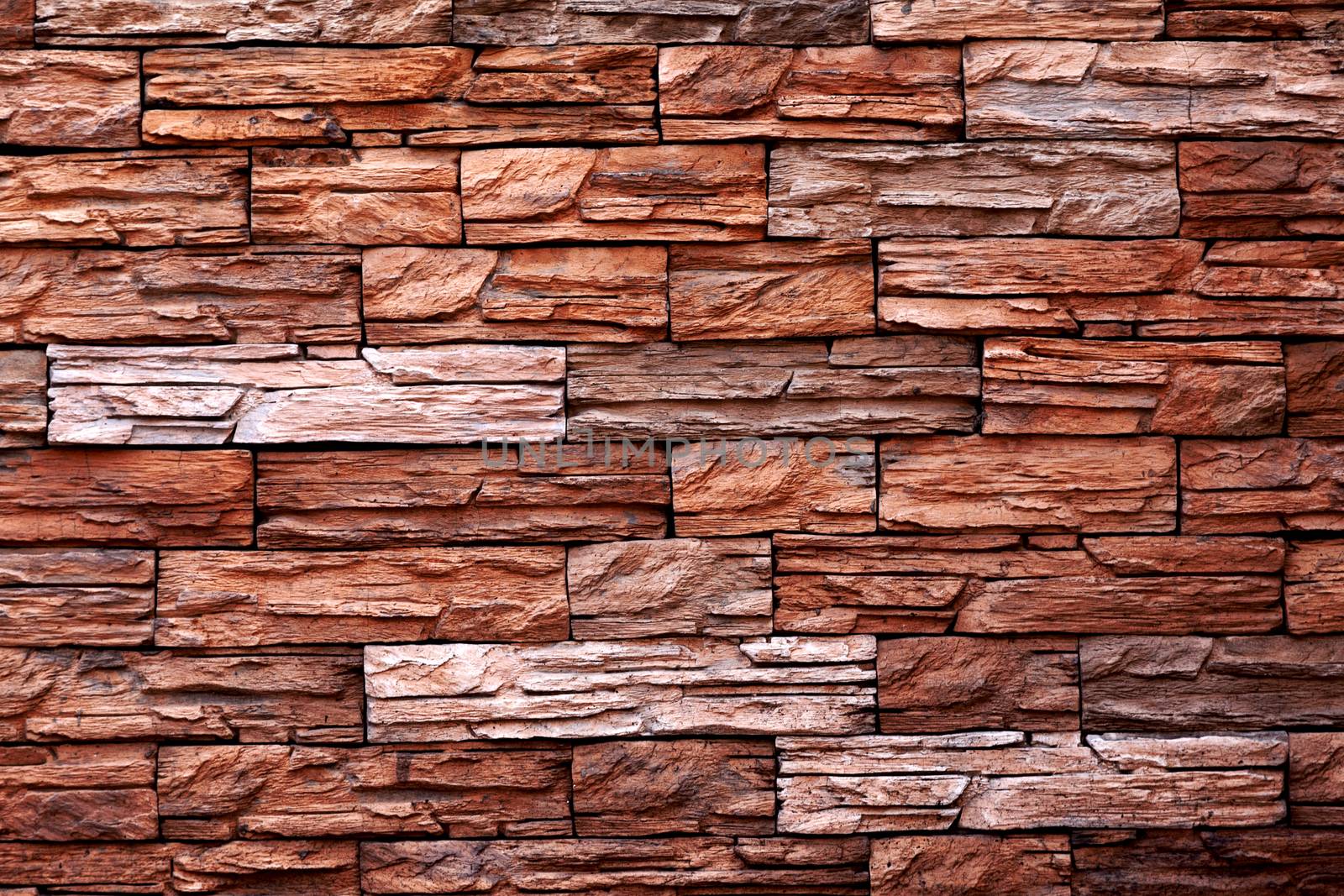 The texture of the red stone wall