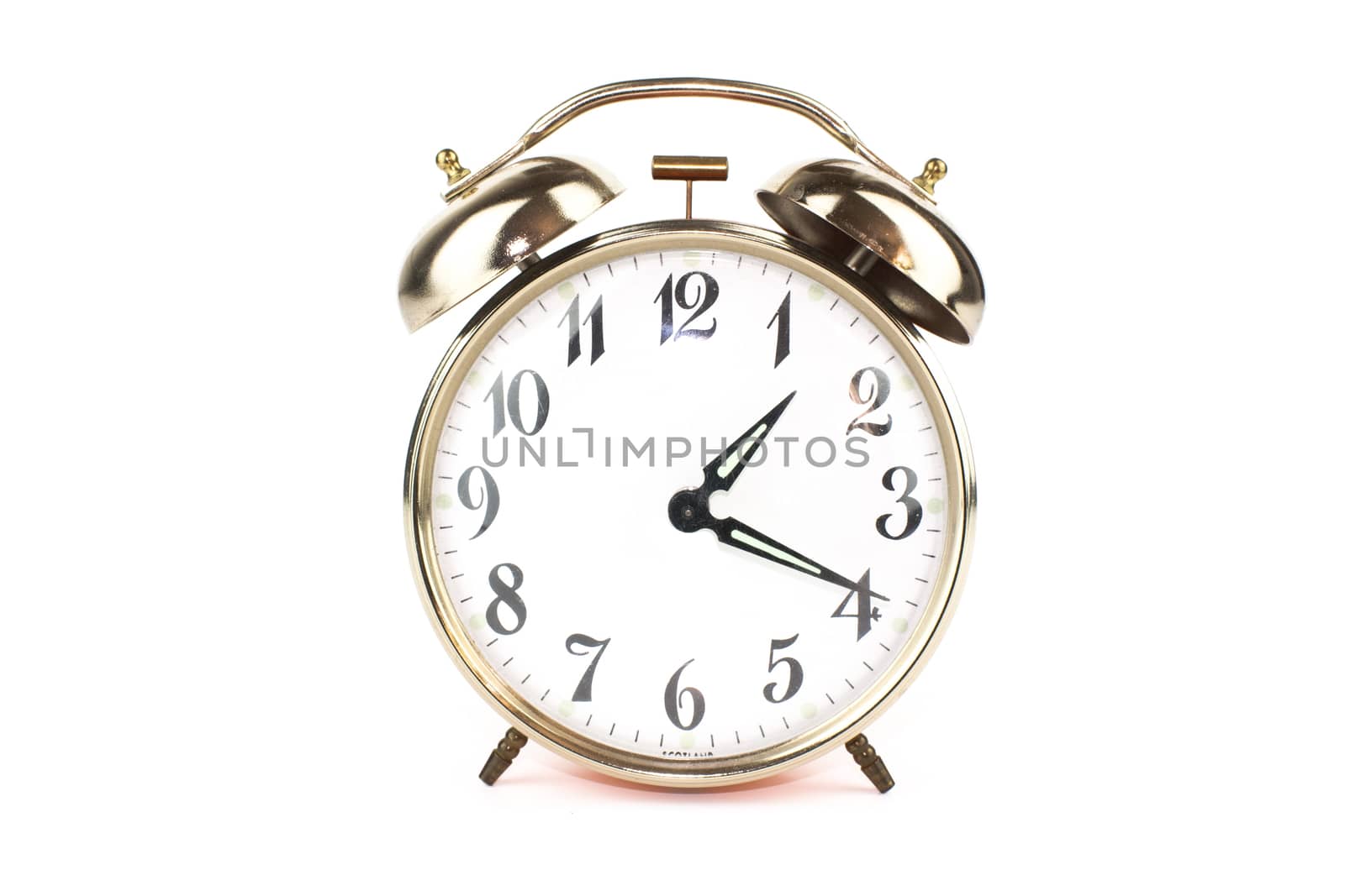 Close up of an alarm clock on a white background