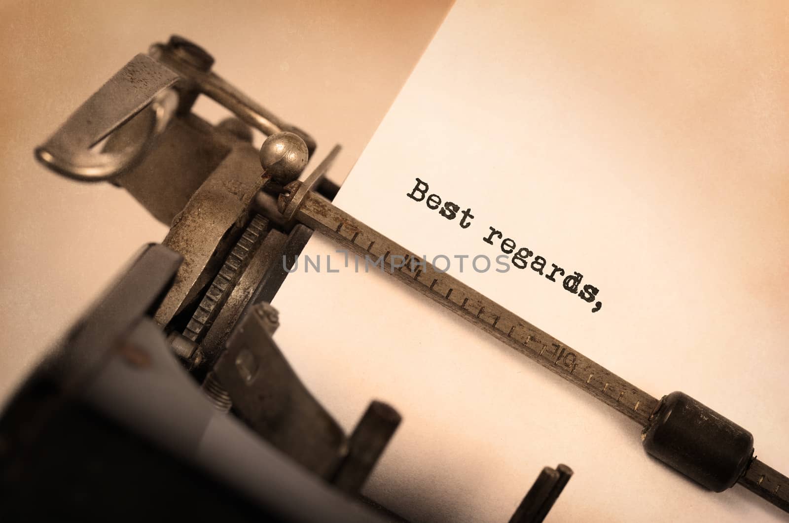 Close-up of a vintage typewriter, old and rusty, best regards