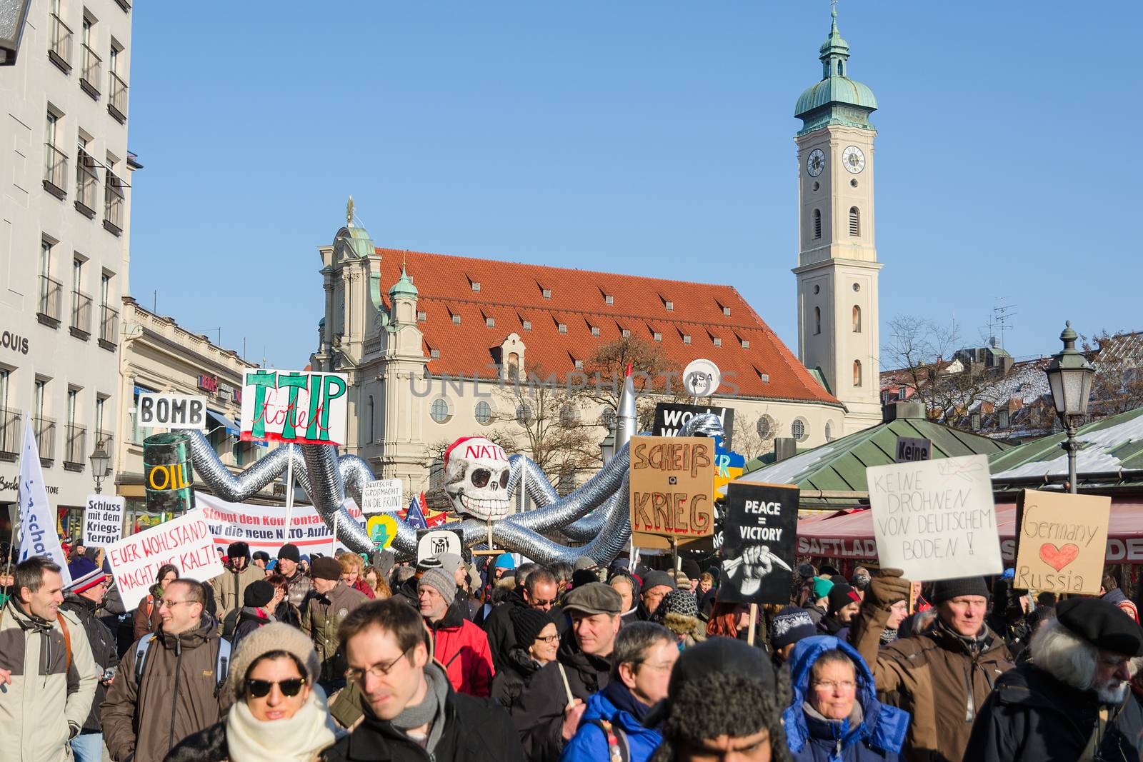 Munich, Germany - February 7, 2015: Peaceful demonstration and protest rally against presence NATO and USA military forces in Europe and eastward expansion. 