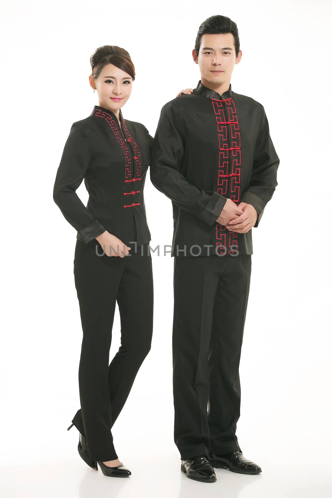 Wearing Chinese clothing waiter in front of a white background