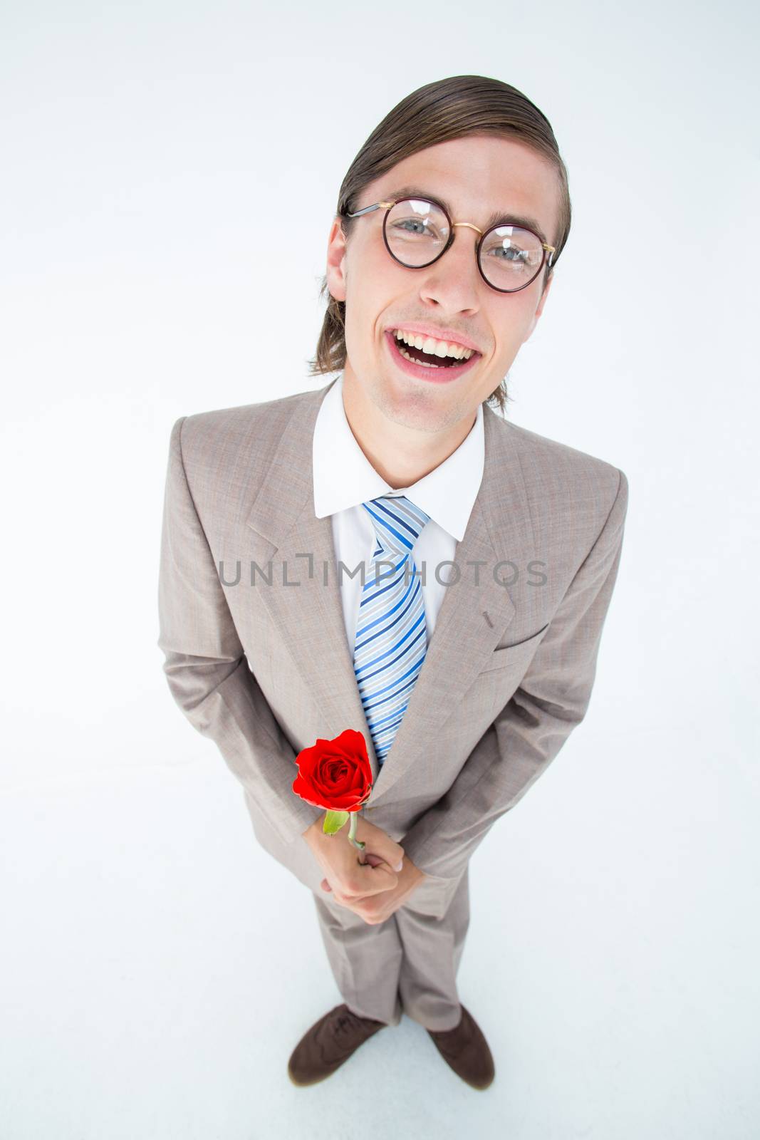 Geeky lovesick hipster holding rose on white background 