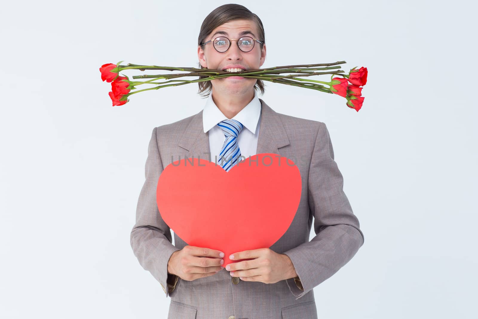 Geeky businessman offering valentines gifts on white background 