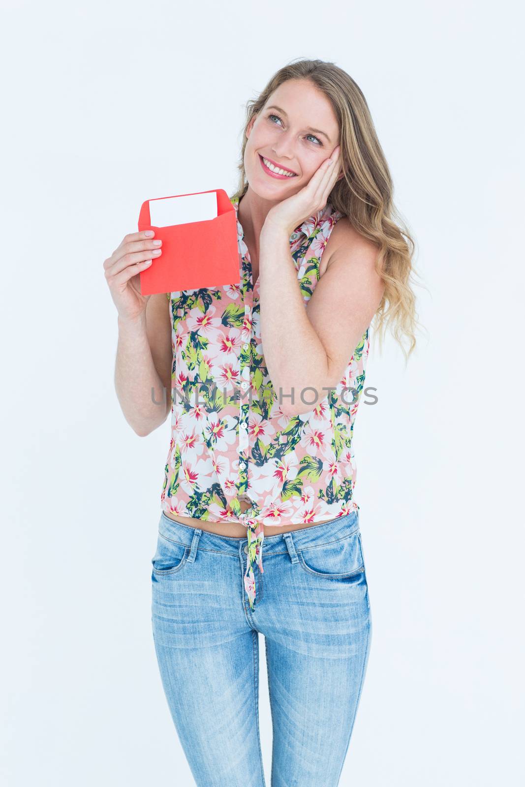 Smiling woman with letter  by Wavebreakmedia
