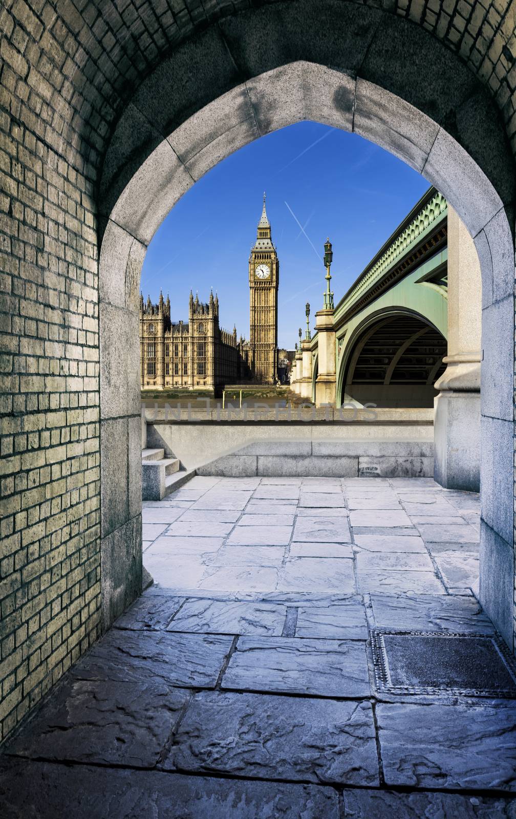 View of Big Ben through the pedestrian tunnel at sunset, London.