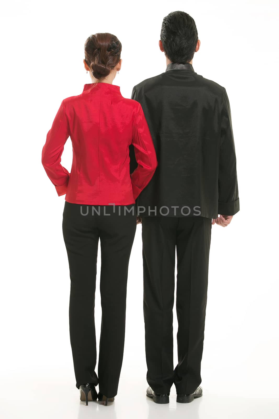 Wearing Chinese clothing waiter in front of a white background