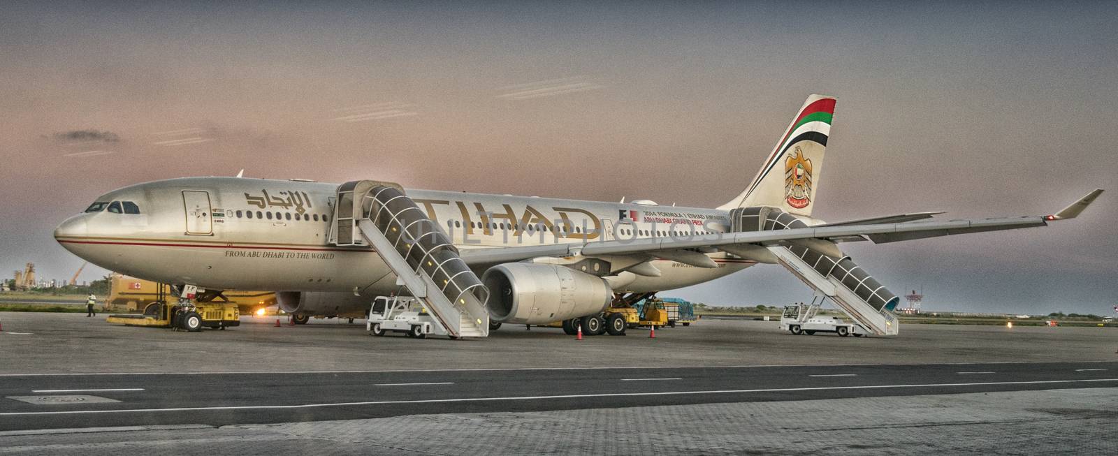 MALE, MALDIVES - FEBRUARY 10, 2015: Etihad Airbus 330 ready to take off. Etihad is the flag carrier airline of the United Arab Emirates with its headquarters in Abu Dhabi.