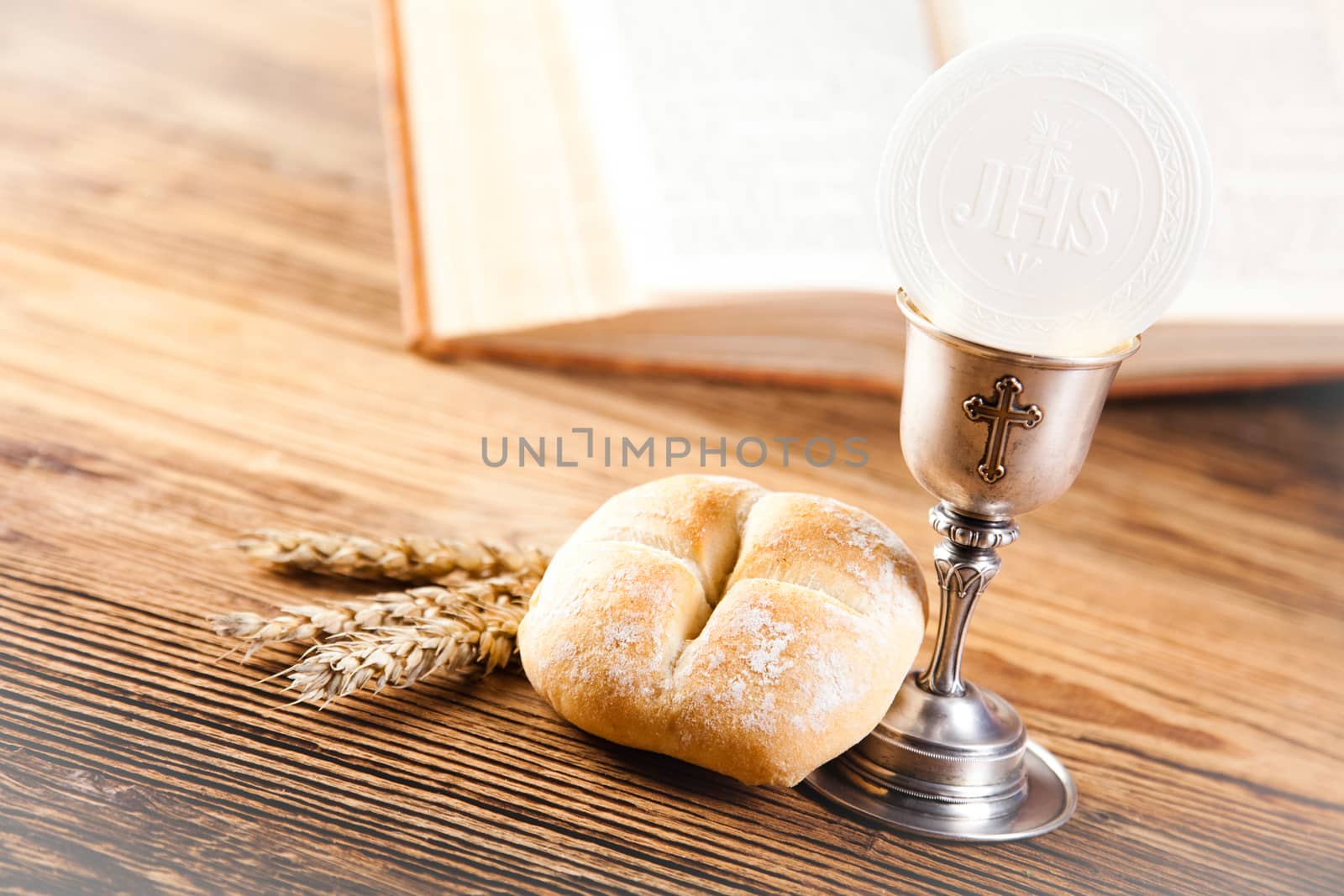 First communion, bright background, saturated concept