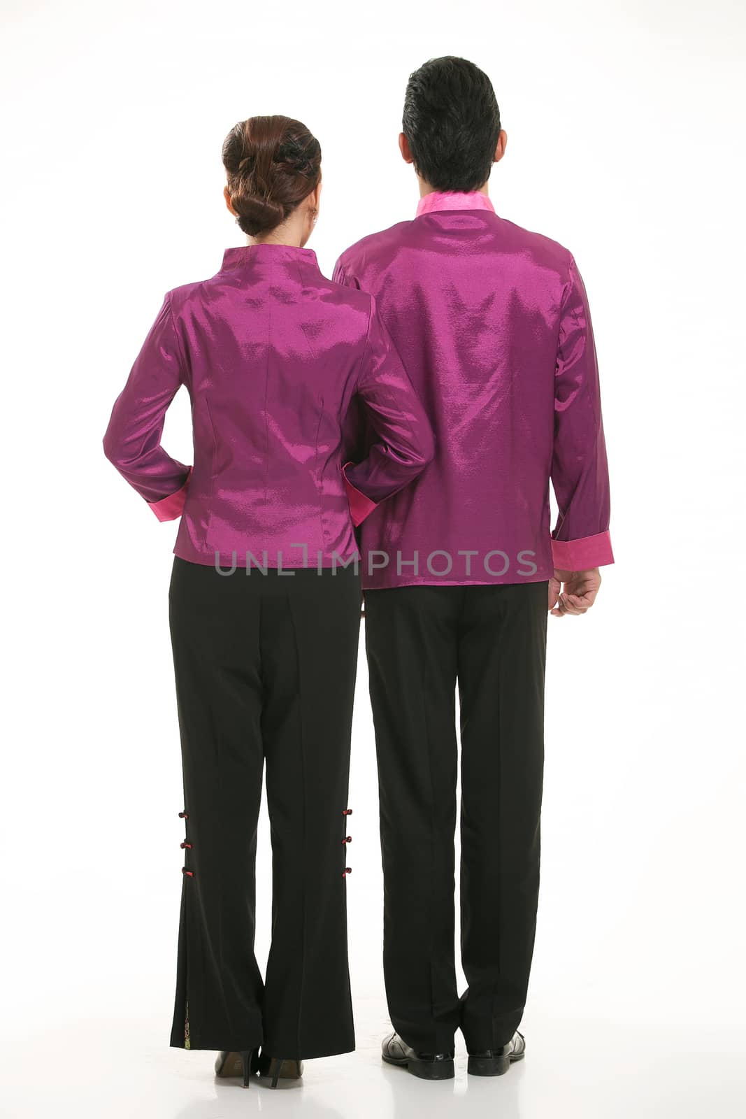 Wearing Chinese clothing waiter in front of a white background