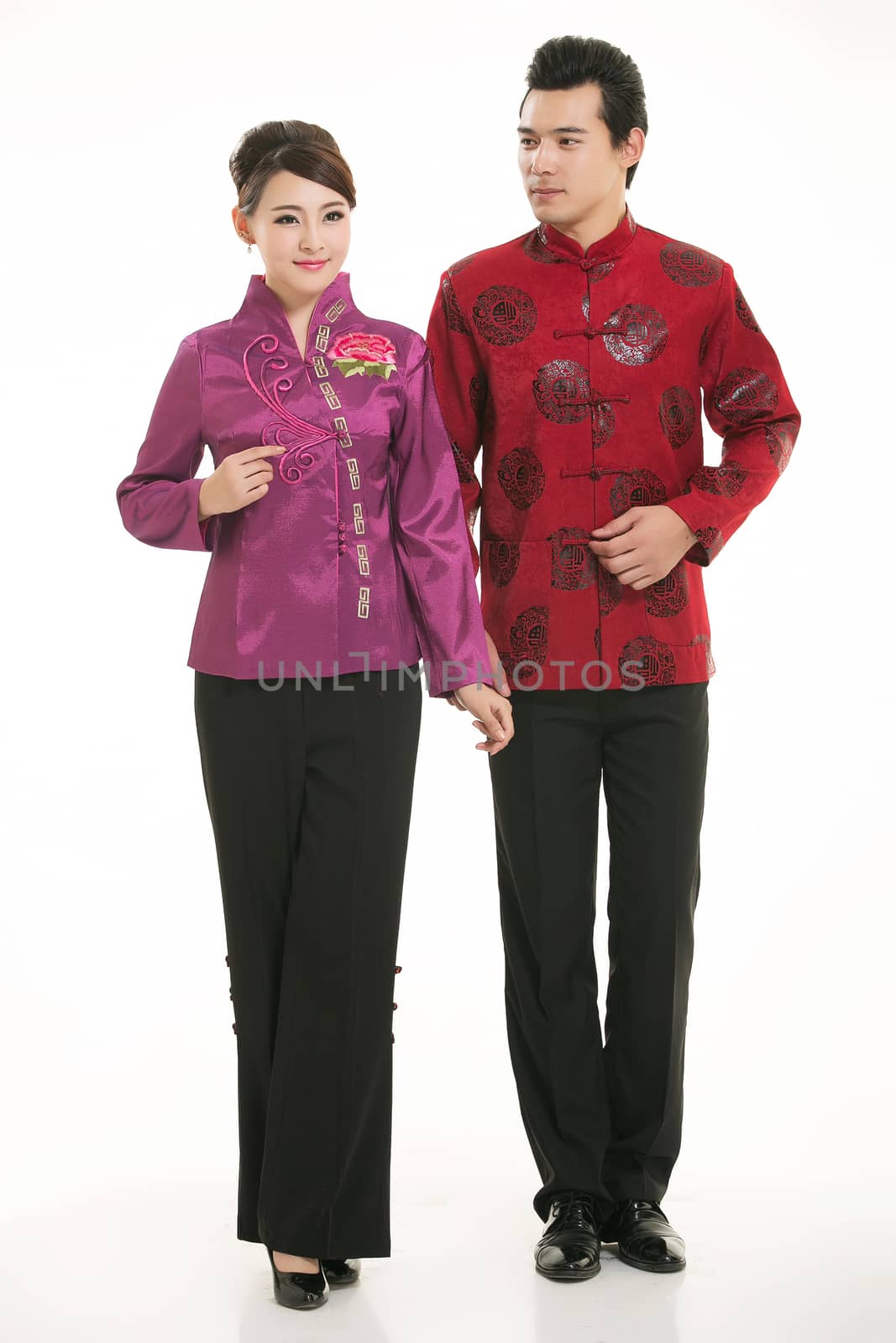 Wearing Chinese clothing waiter in front of a white background