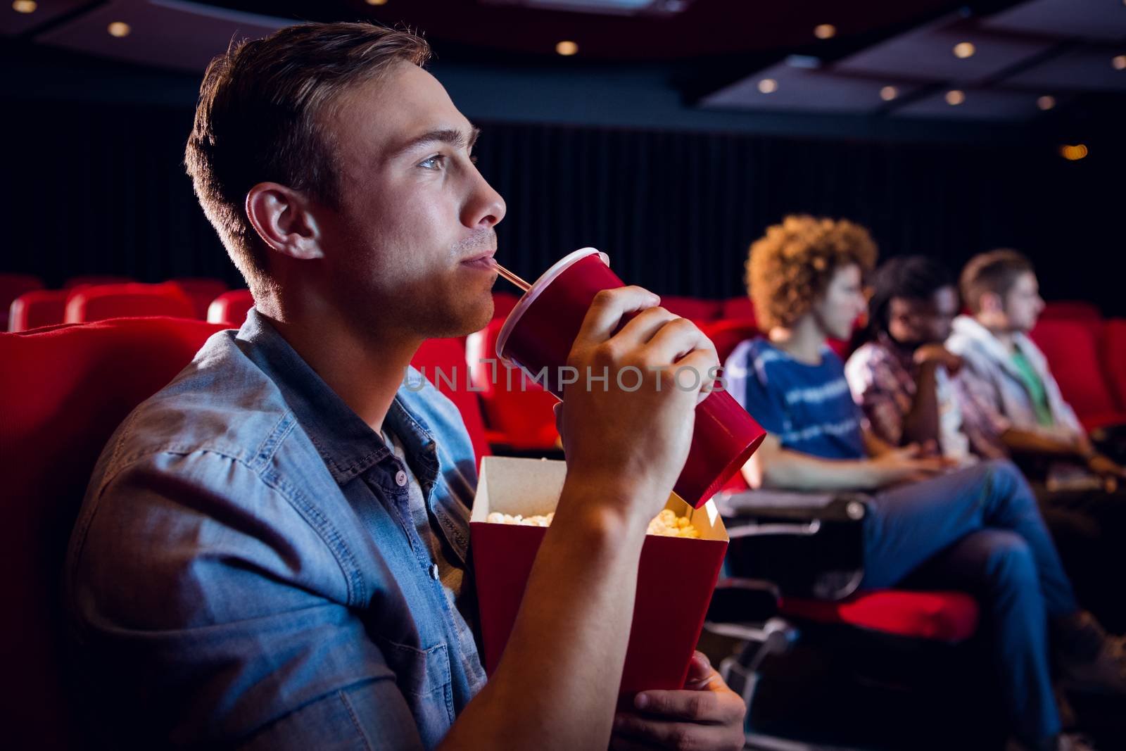 People watching a film at the cinema 