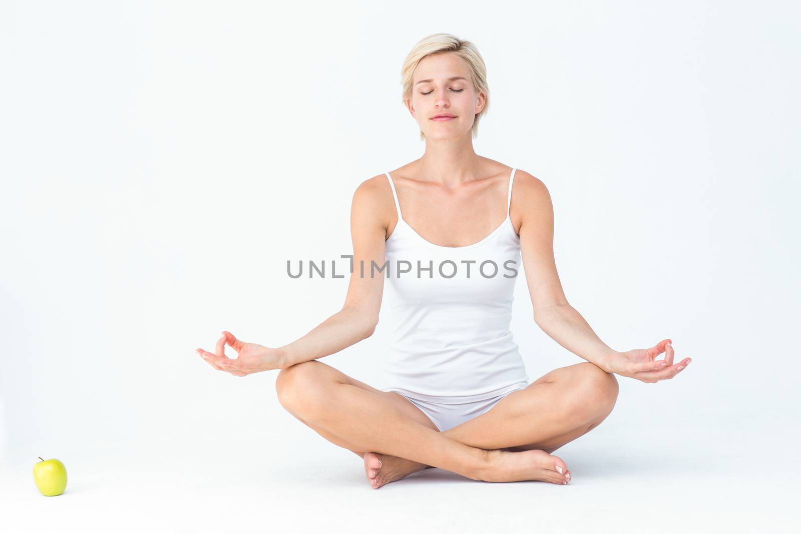  Fit woman doing yoga by Wavebreakmedia