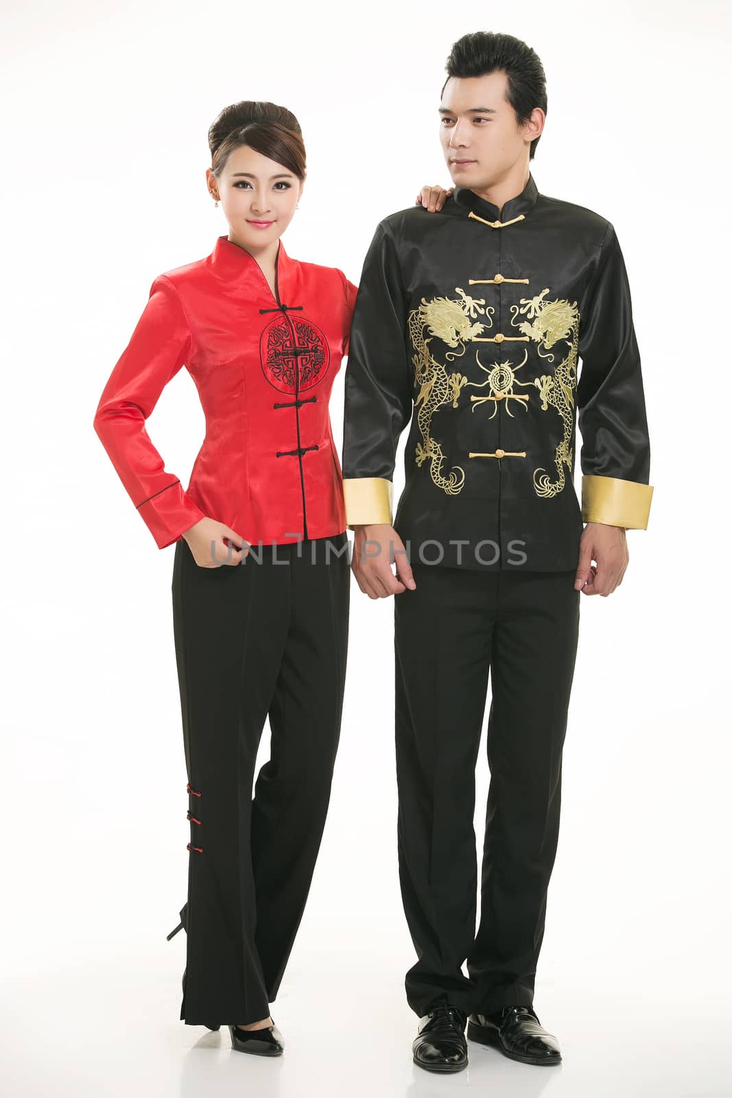 Wearing Chinese clothing waiter in front of a white background