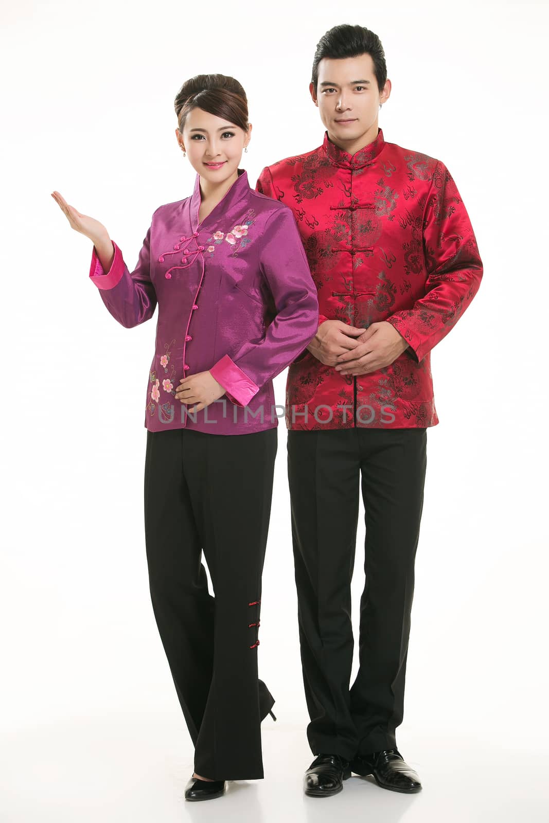 Wearing Chinese clothing waiter in front of a white background