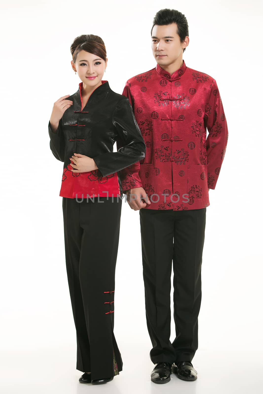 Wearing Chinese clothing waiter in front of a white background