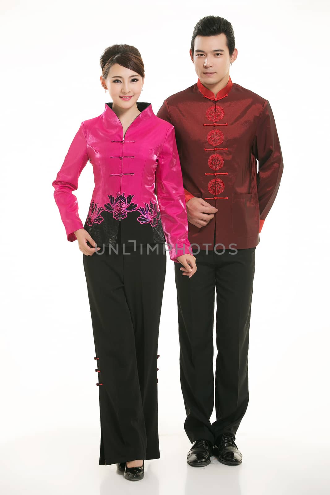 Wearing Chinese clothing waiter in front of a white background