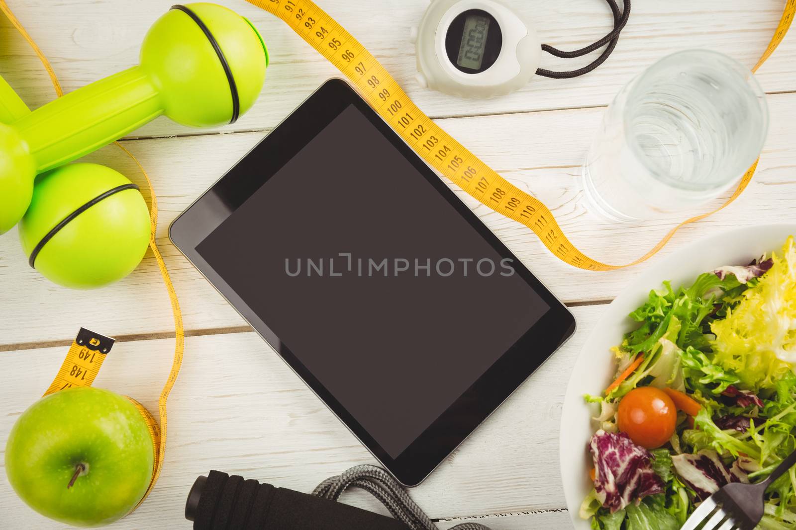 Tablet with indicators of healthy lifestyle by Wavebreakmedia