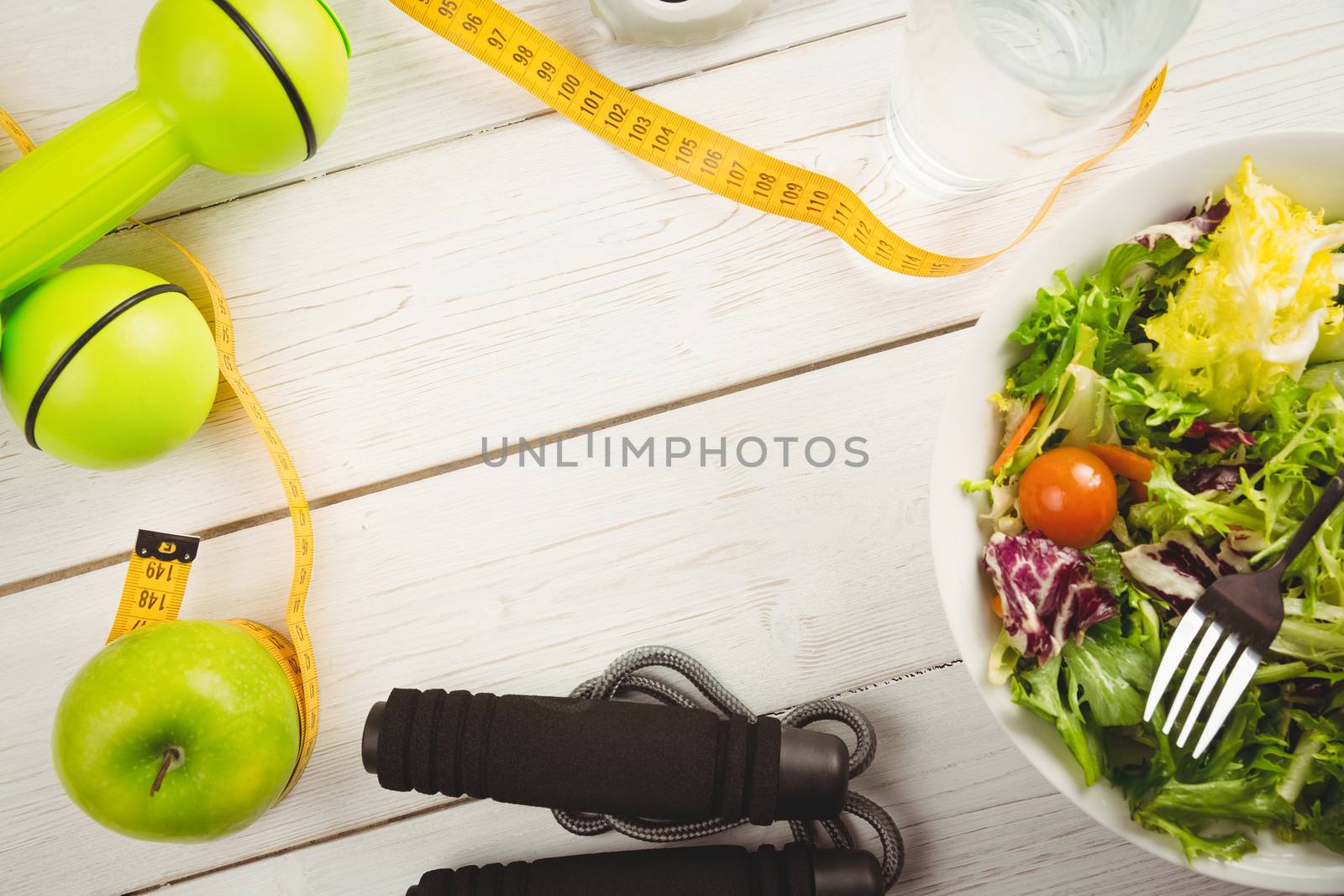 Indicators of healthy lifestyle on wooden table