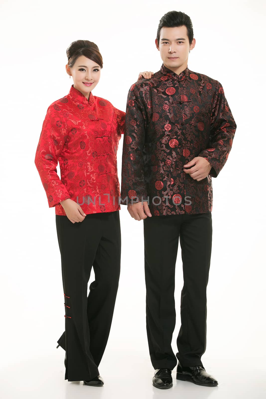 Wearing Chinese clothing waiter in front of a white background