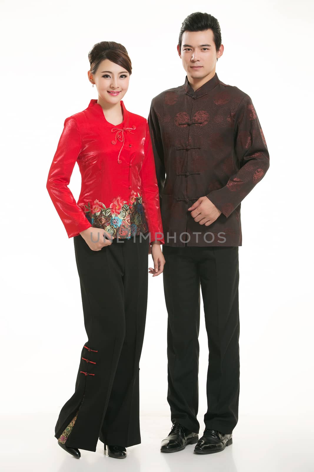 Wearing Chinese clothing waiter in front of a white background